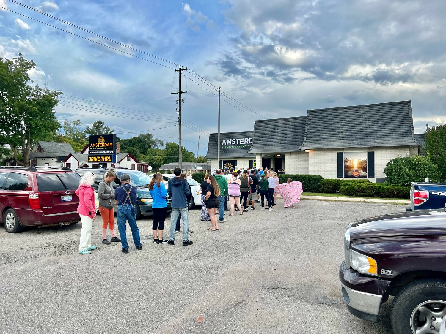    Over 50 people joined Amsterdam Premium Cannabis Company and the Harrison Chamber of Commerce for the ribbon cutting for Amsterdam’s official grand opening on Saturday, Sept. 2.